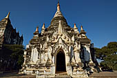 Old Bagan Myanmar. Thatbyinnyu Temple. Ground level view from the northeast showing the Guyogyohpaya, Bagan monument number 1599. 